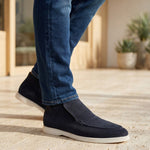 Ankle loafers in dark navy suede lifestyle with denim jeans