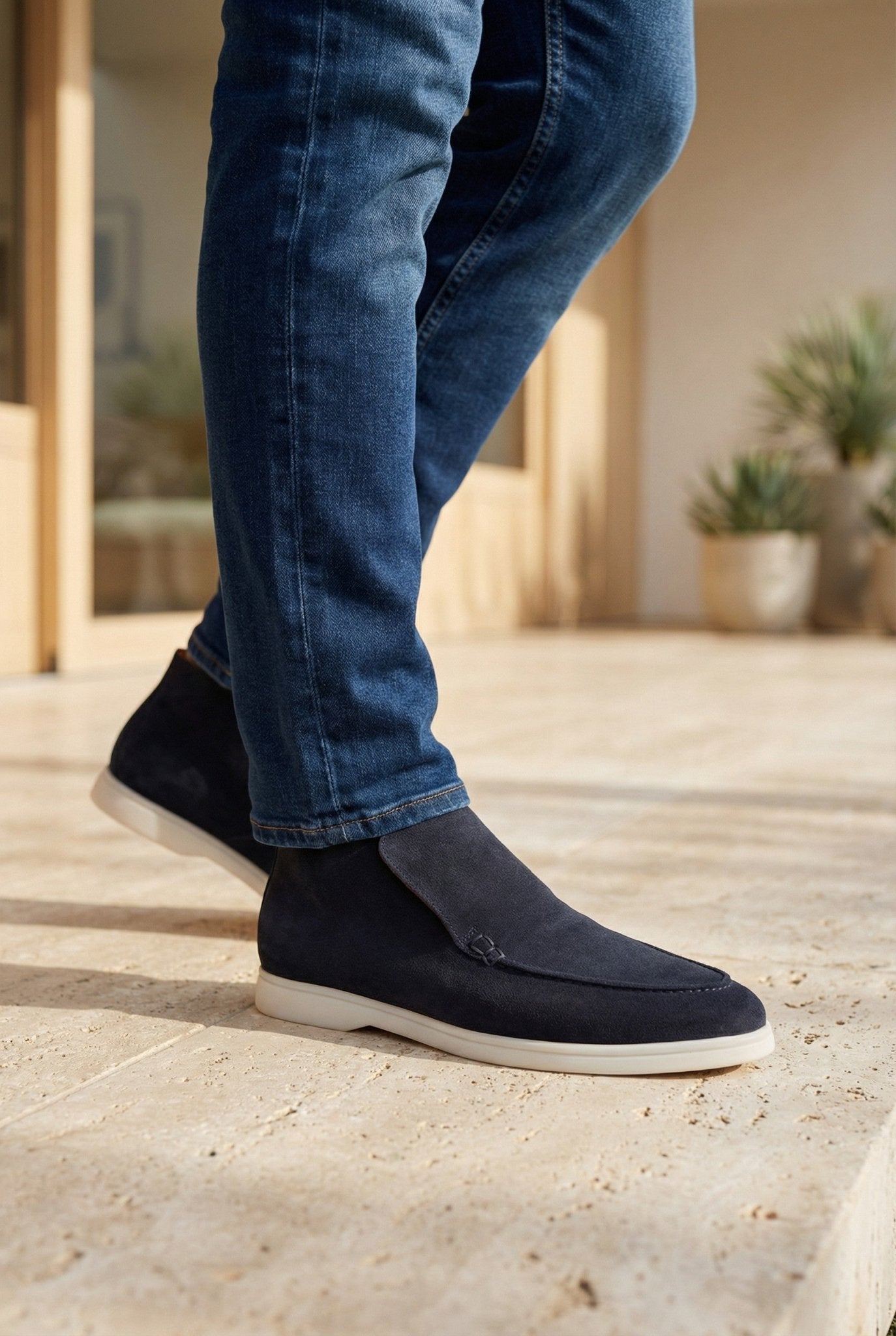 Ankle loafers in dark navy suede lifestyle with denim jeans