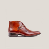 Reinhard Frans Stockholm cognac brown leather monk strap boots with silver buckle detail.