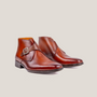 Reinhard Frans Stockholm light cognac brown leather monk strap boots with silver buckle detail.