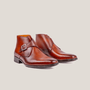 Reinhard Frans Stockholm light cognac brown leather monk strap boots with silver buckle detail.
